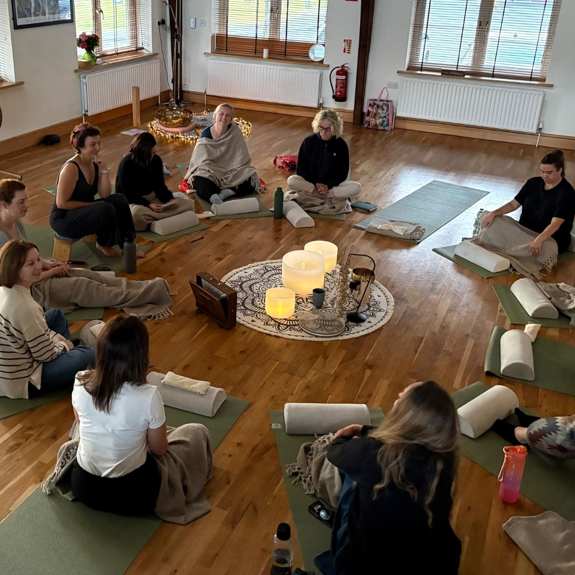 Sound Healing Practitioner facilitating a Sound Bath