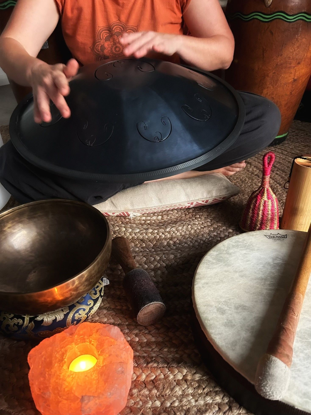 Sound Healing Practitioner playing a hand pan