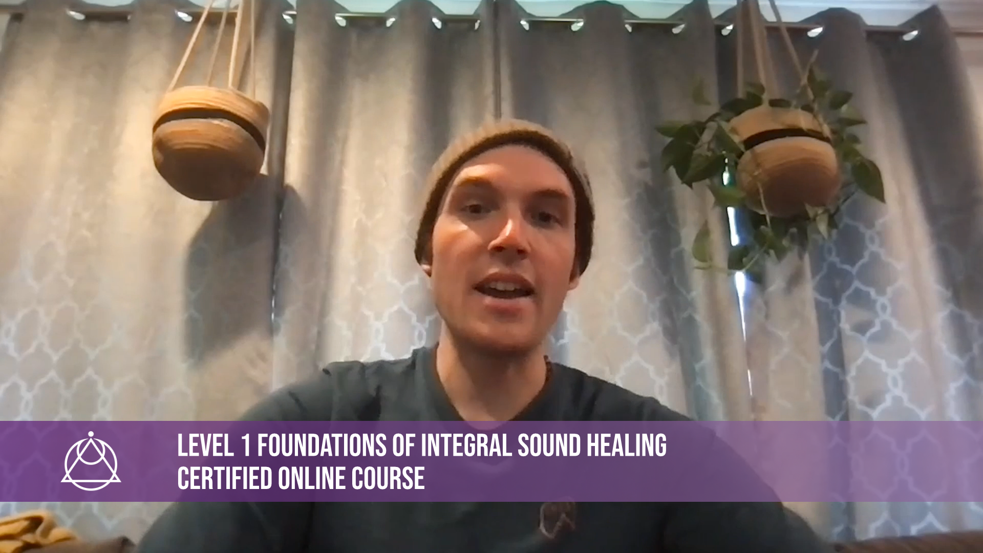 Man giving a sound healing academy review for Level 1 Foundations of Integral Sound Healing course online in the training room in Birmingham
